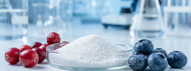 White sodium benzoate powder and cranberries in a lab